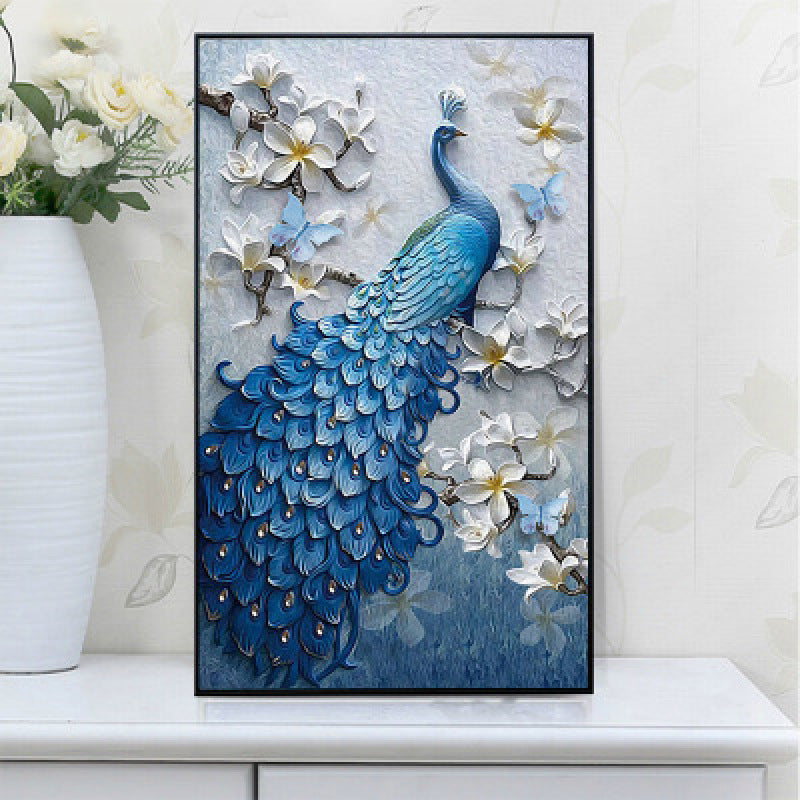 Peacock cross stitch wall art featuring detailed blue peacock with flowers and butterflies in elegant embroidery