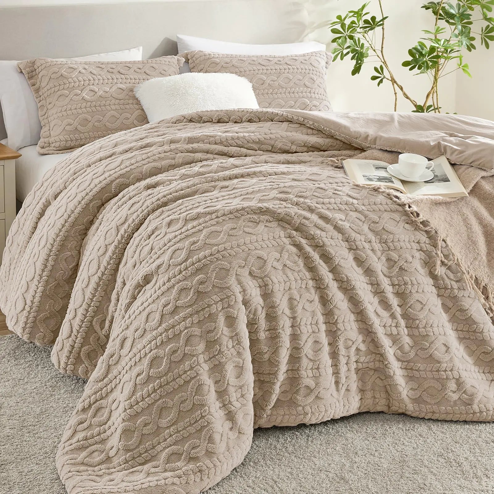 Beige sherpa twin comforter set with textured cable knit design on a made bed with pillows