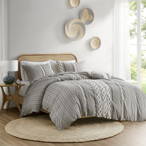 Shopi Vella cotton duvet cover set queen in gray with textured stripes and decorative pillows on wooden bed