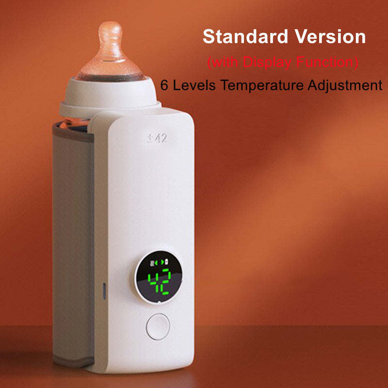 Shopi Vella portable baby bottle warmer with digital display and six temperature levels in white