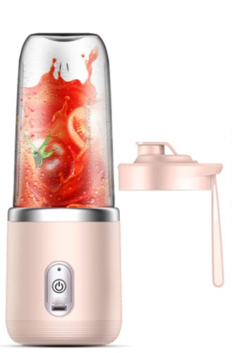 Shopi Vella portable blender for smoothies in pink with detachable lid and fresh tomatoes inside