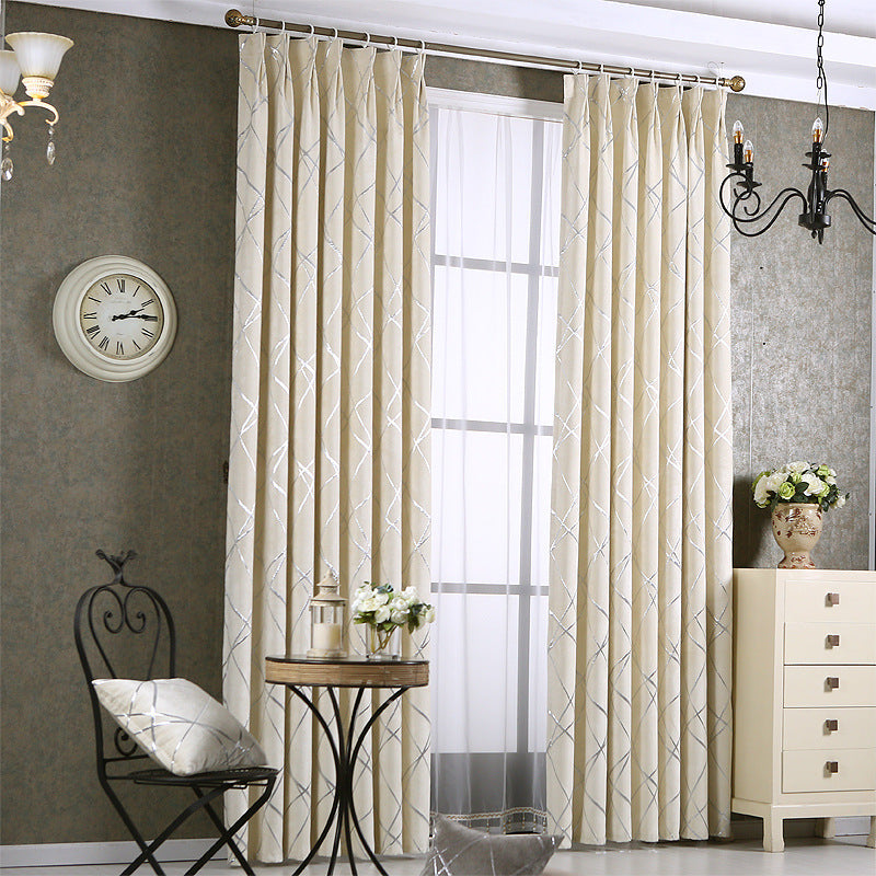 Shopi Vella beige solid color living room curtains hanging in stylish room with chair and table