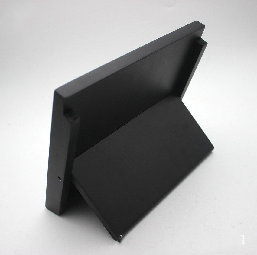Black tool storage rack organizer for knives and accessories by Shopi Vella