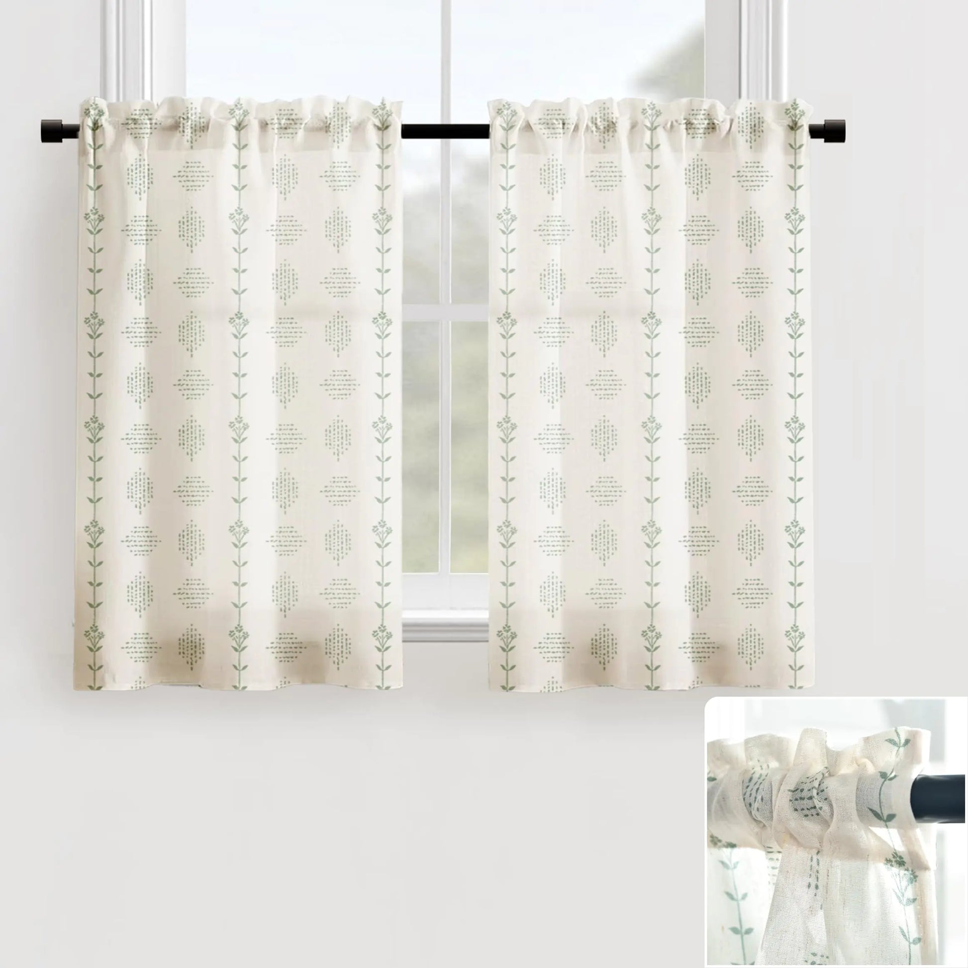 Cream and green patterned under sink cabinet curtains hanging on a black rod in front of a window