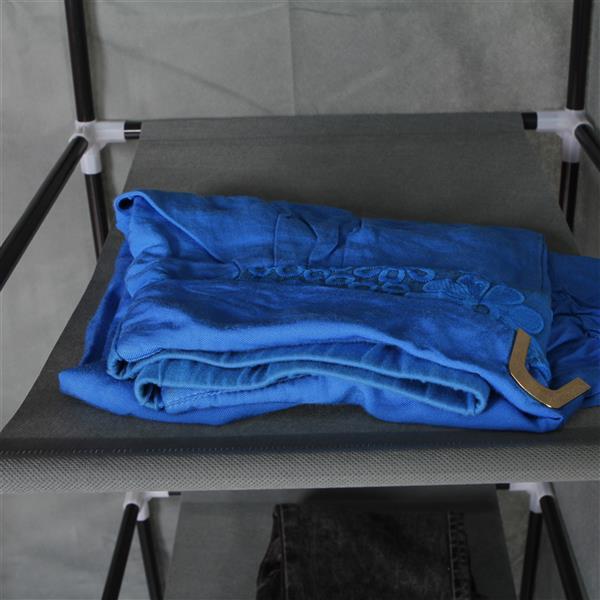 12 grid fabric closet with shelves featuring folded blue clothing for organized wardrobe storage