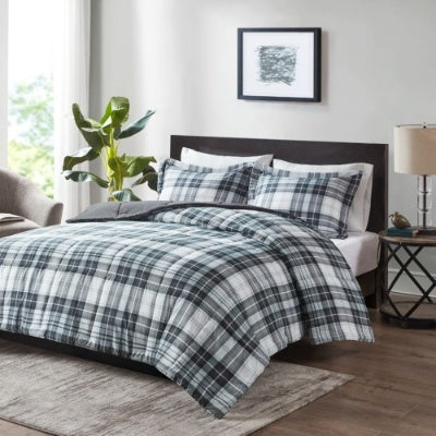 Scotchgard comforter set by Shopi Vella in gray and white plaid pattern on a bedroom bed