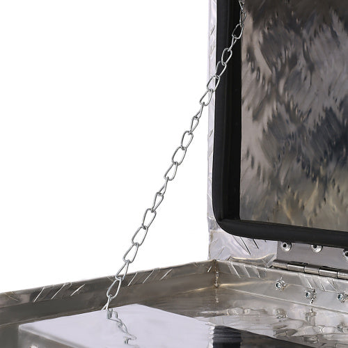 Close-up of 24 inch aluminum truck tool box chain and inner lid with diamond plate pattern