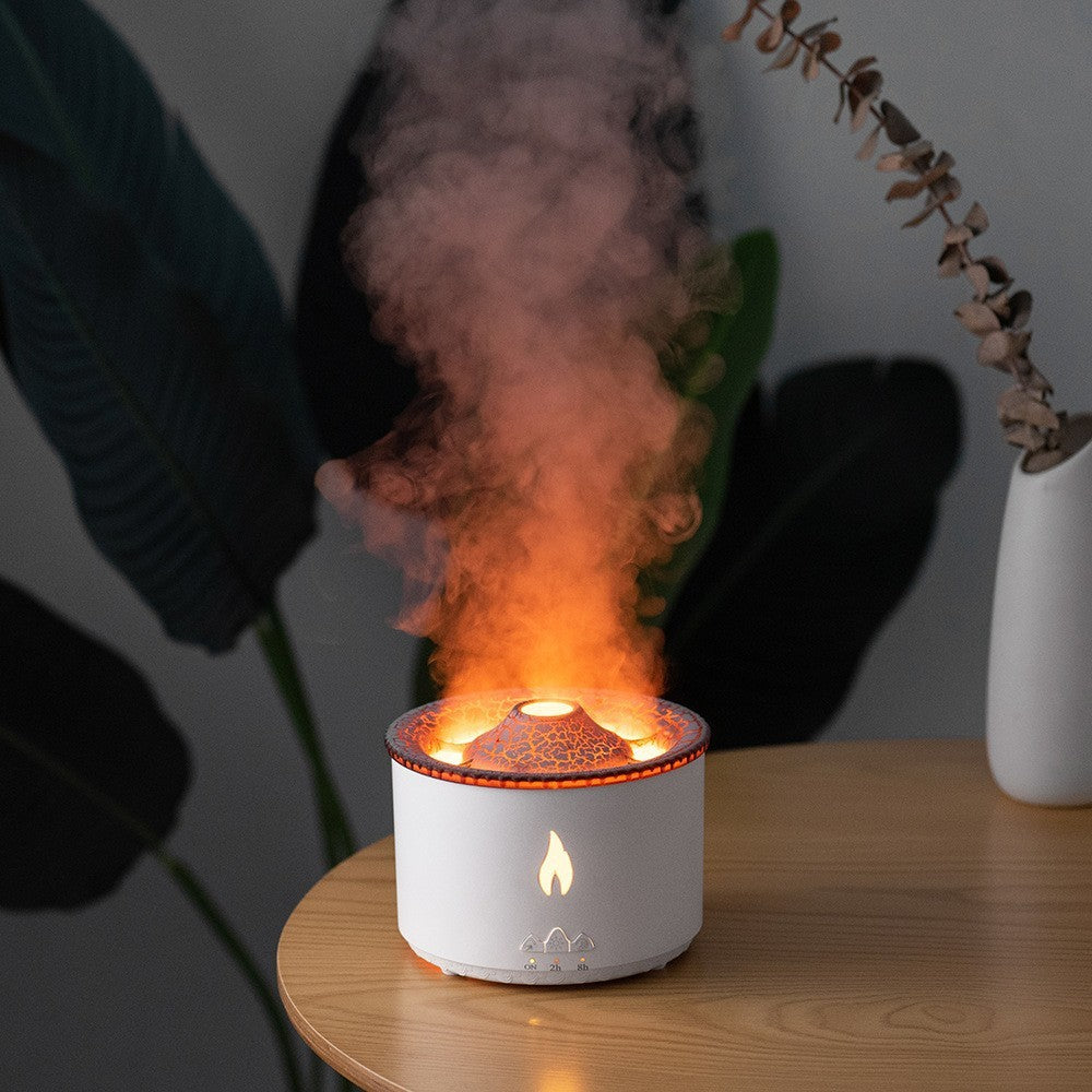Shopi Vella color changing humidifier with night light releasing warm mist on wooden table