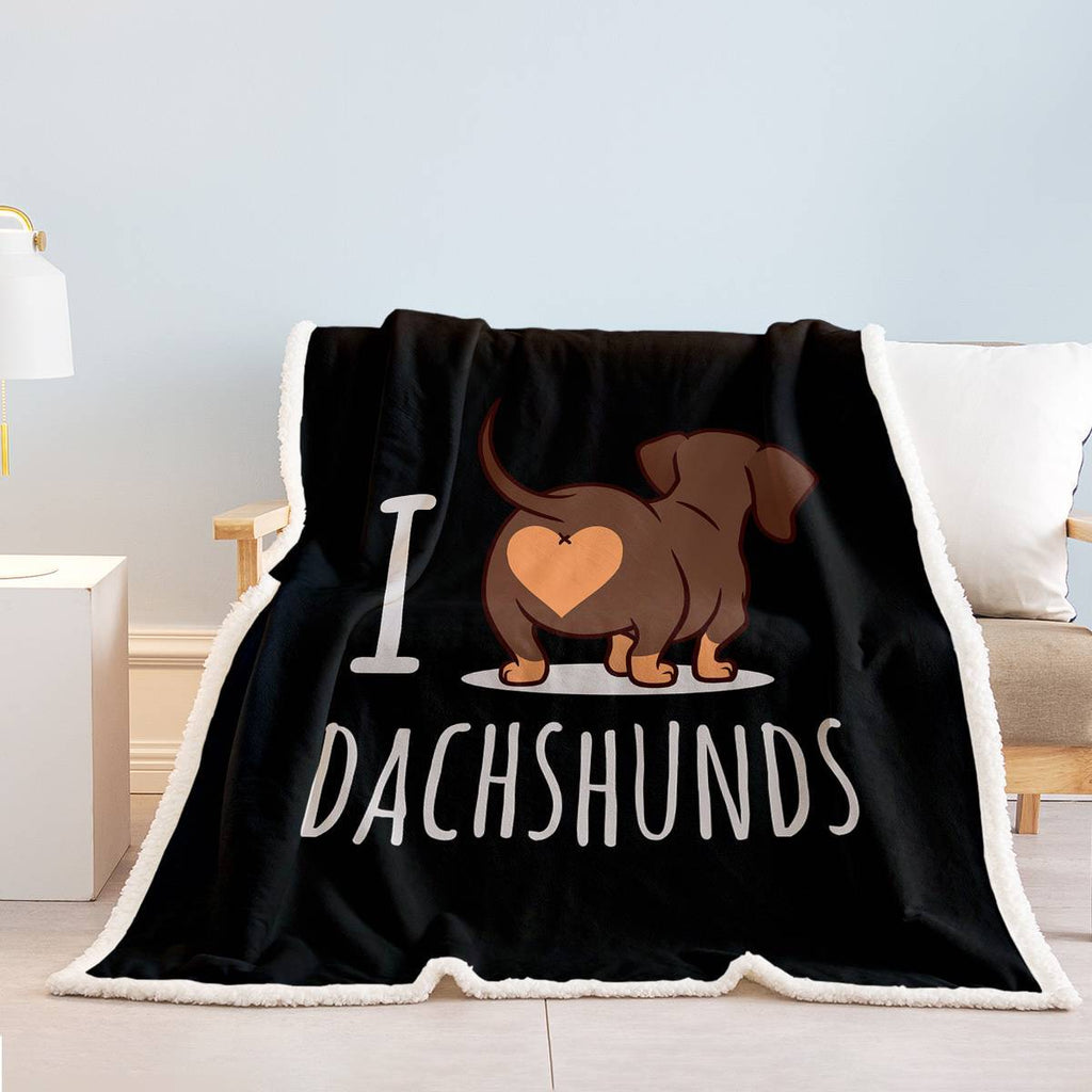 Shopi Vella black 3D printed dog blanket with I love dachshunds design on cozy bed
