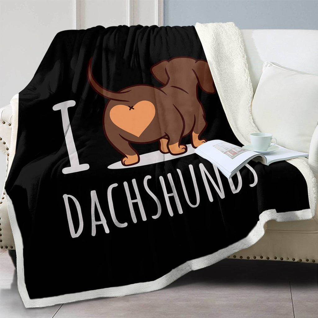 Shopi Vella 3D printed dog blanket with I love dachshunds design draped over a white sofa