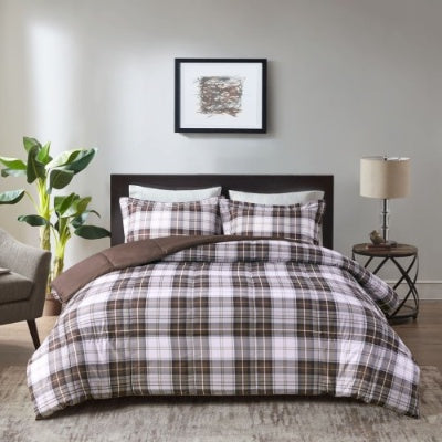 Shopi Vella Scotchgard comforter set with brown and white plaid design on a bed in a modern bedroom