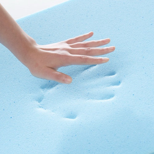 Hand pressing soft blue memory foam of adjustable back support pillow for comfort and support