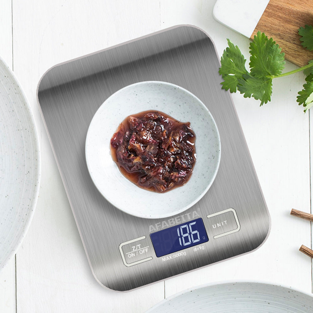 Shopi Vella 5kg kitchen measuring scale with digital display weighing a bowl of food