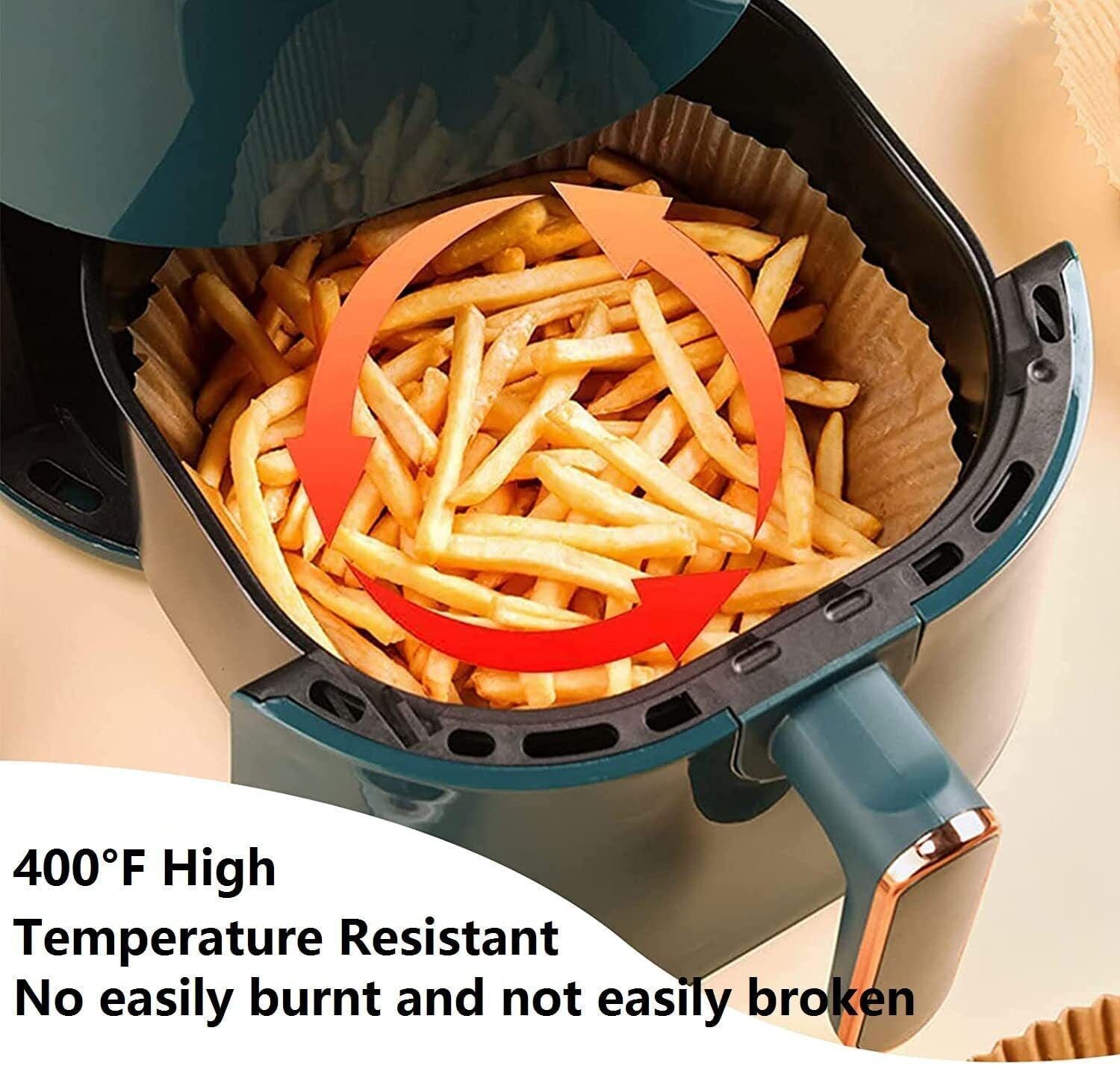 Shopi Vella air fryer disposable liners in air fryer basket with crispy golden fries and high heat resistance
