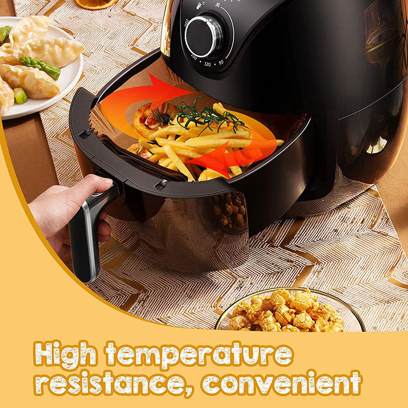 Shopi Vella air fryer with air fryer disposable paper liners holding fries and vegetables