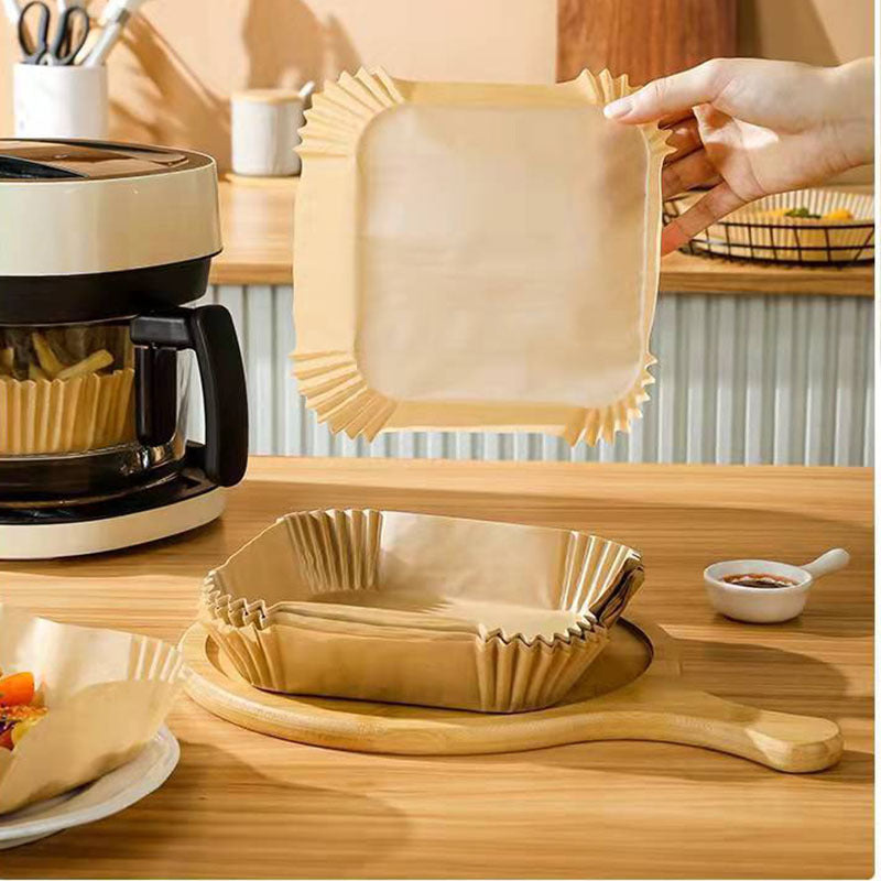Shopi Vella air fryer disposable paper liners shown in use with air fryer for easy cleanup