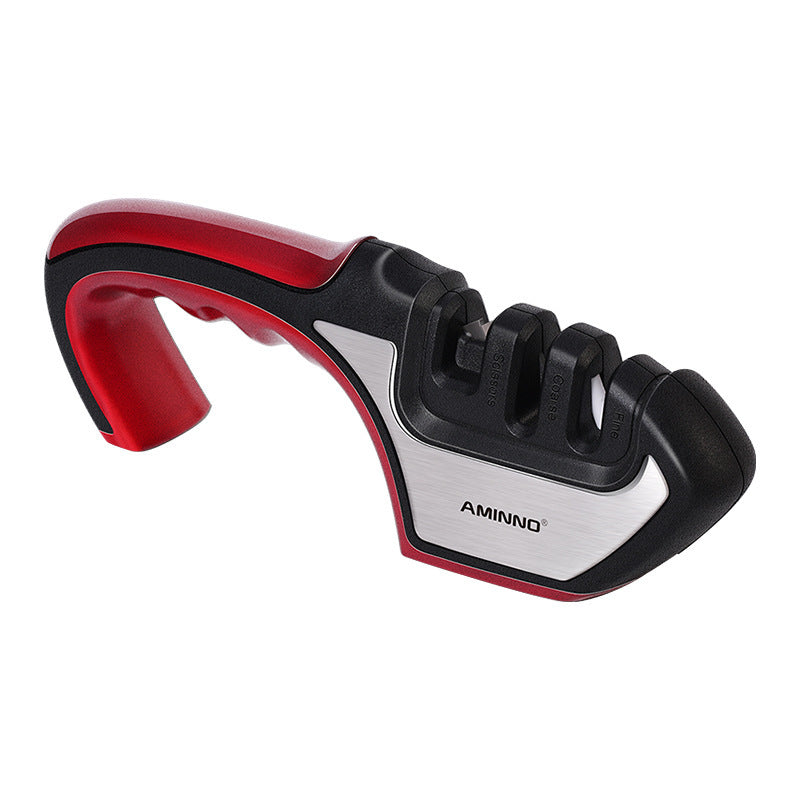 Shopi Vella four-in-one kitchen knife sharpener with ergonomic red and black handle and multiple sharpening slots