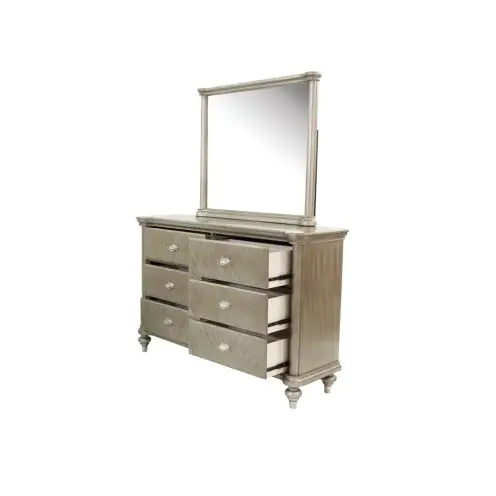 Antique champagne finish bedroom furniture dresser with six drawers and an attached mirror
