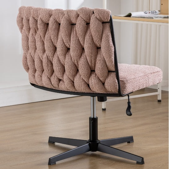 Shopi Vella armless office desk chair with tufted pink fabric and black metal base on hardwood floor