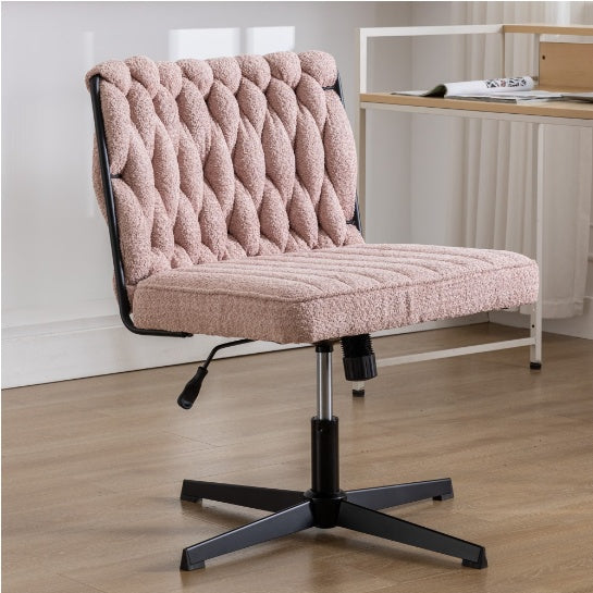 Shopi Vella armless office desk chair with pink tufted fabric and black metal base on wood floor