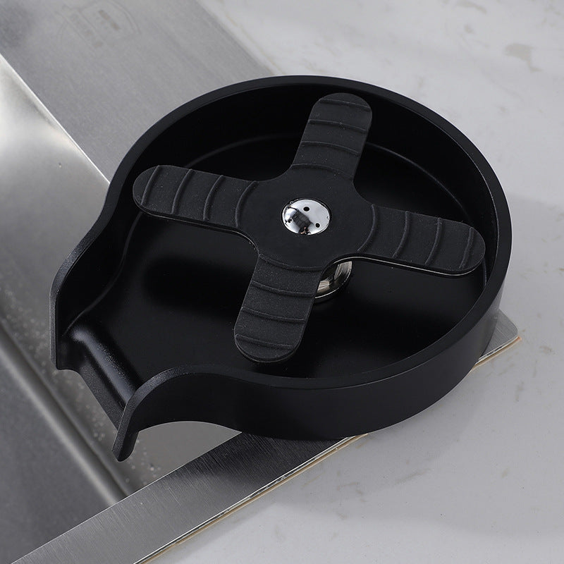 Shopi Vella automatic cup washer for sink in black with rotating cross design