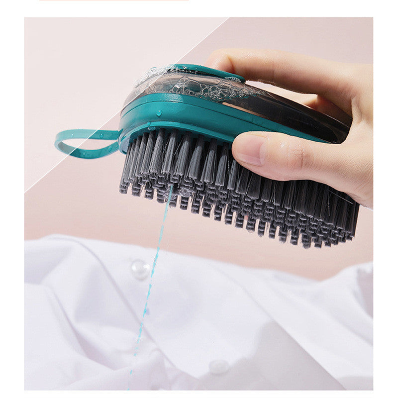 Shopi Vella automatic liquid cleaning brush dispensing soap on a shirt for efficient kitchen storage cleaning