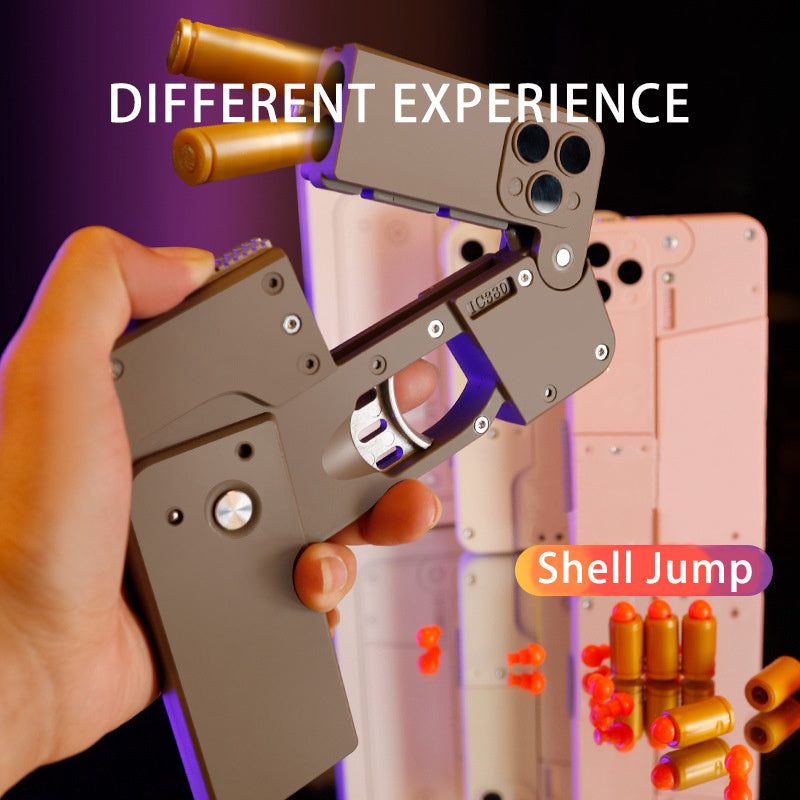 Shopi Vella automatic shell throwing toy pistol held in hand with shells ejected for home storage play