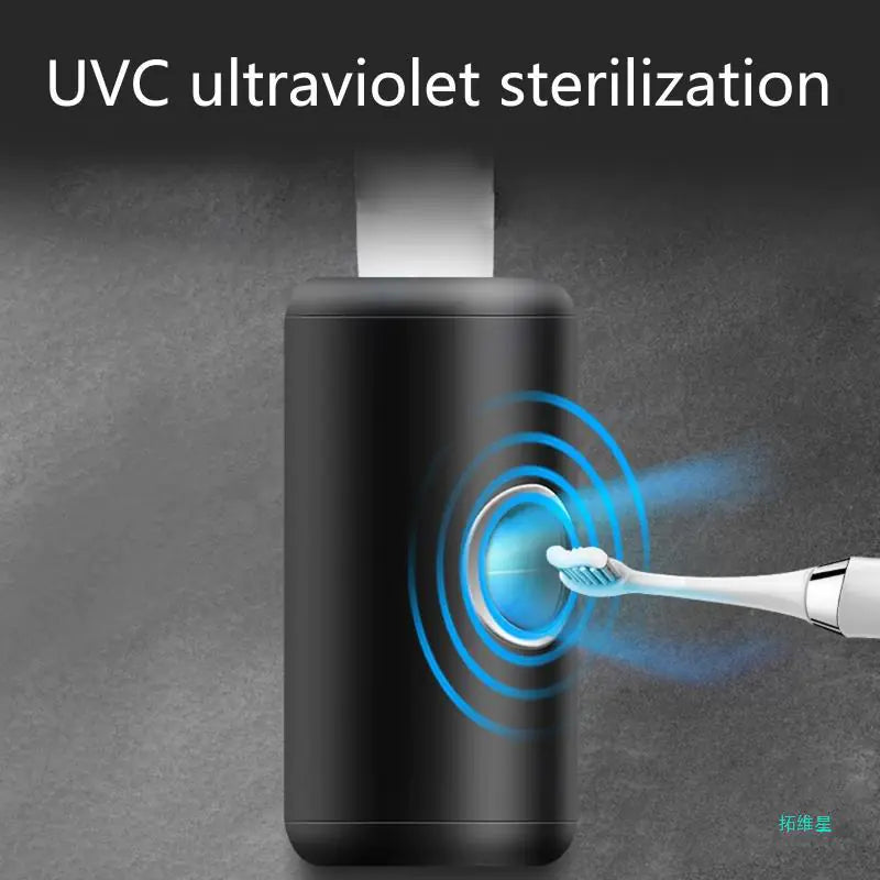 Black automatic toothpaste dispenser with UVC ultraviolet sterilization and toothbrush sensor