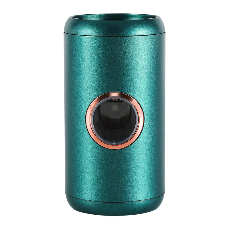 Green metallic automatic toothpaste dispenser with circular dispensing window