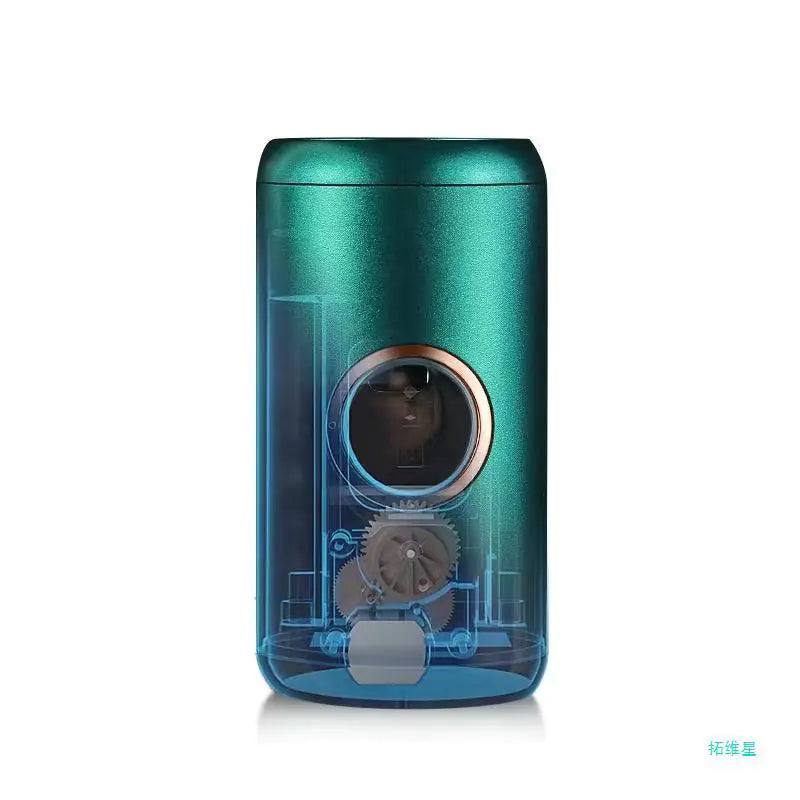 Sleek green automatic toothpaste dispenser with visible internal gears and modern design