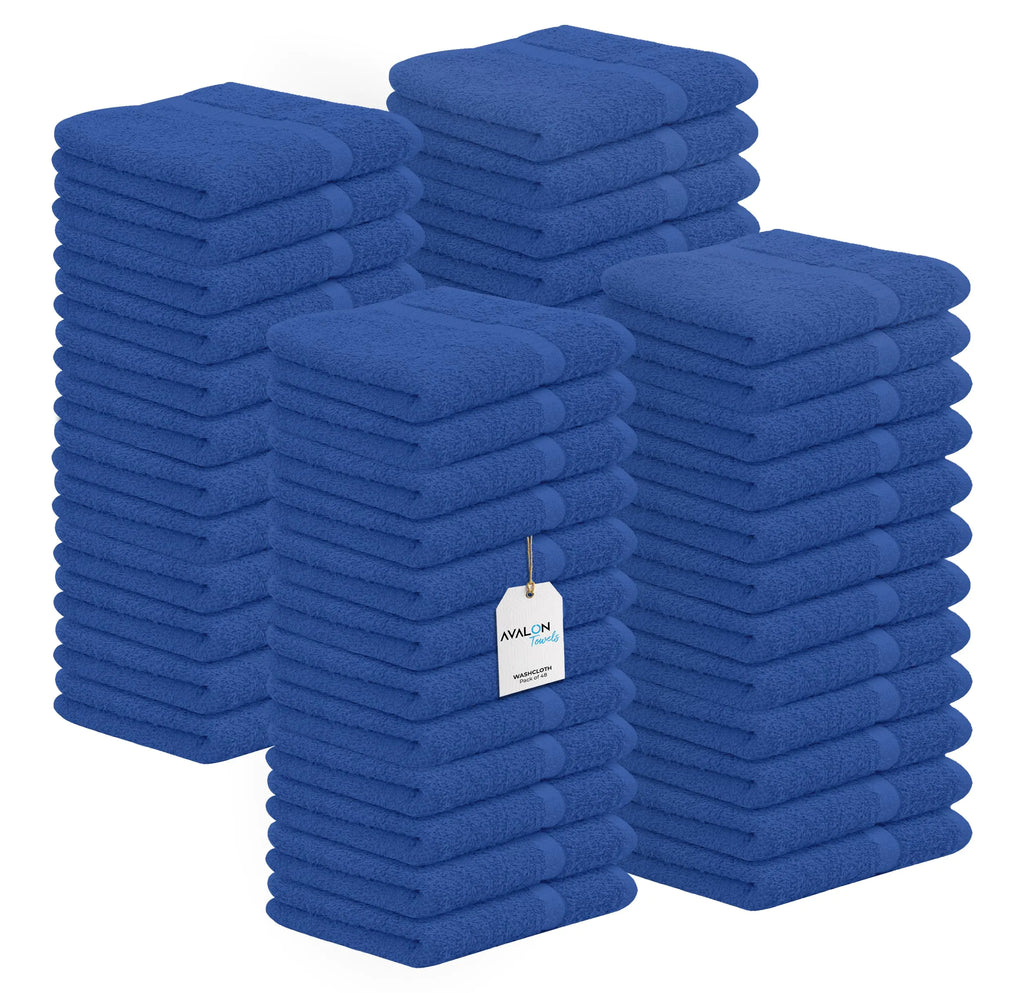 Stacks of blue face towels for gym made of soft absorbent cotton in bulk set