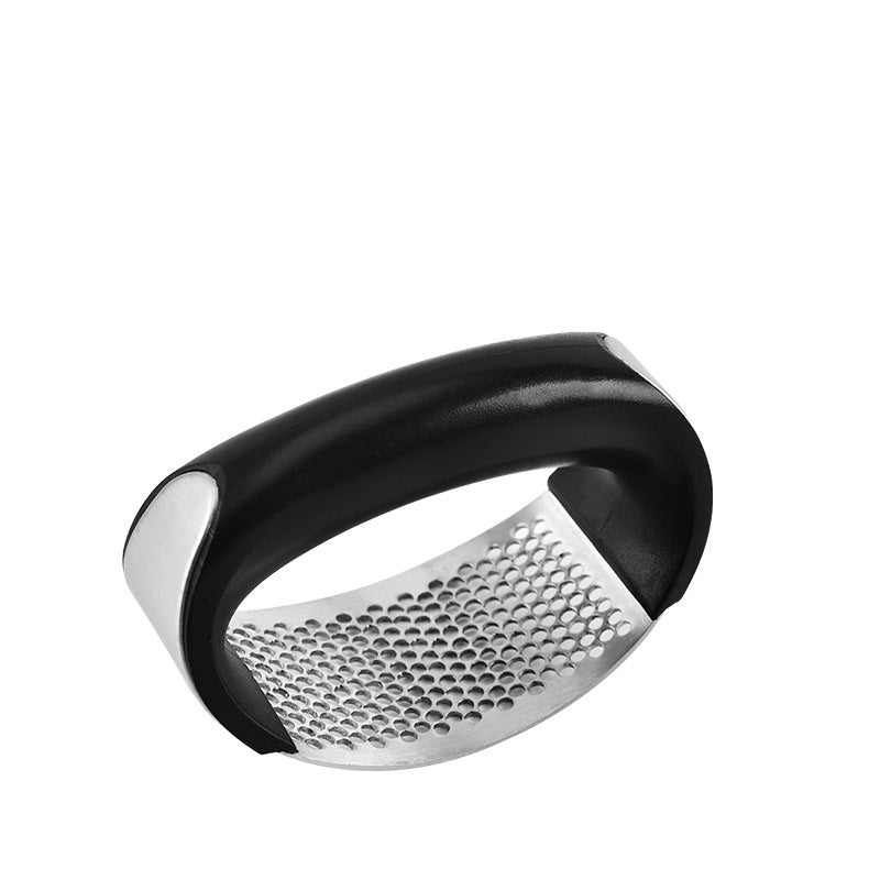 Shopi Vella stainless steel garlic press with ergonomic black handle for easy garlic crushing