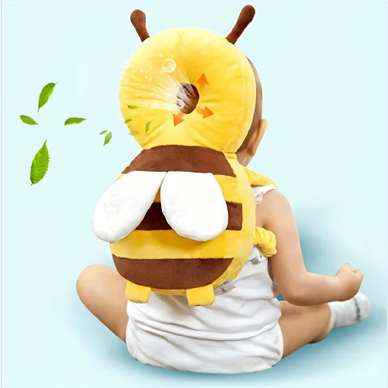 Baby wearing a bee-shaped baby head protection pillow designed to cushion head impacts and provide safety