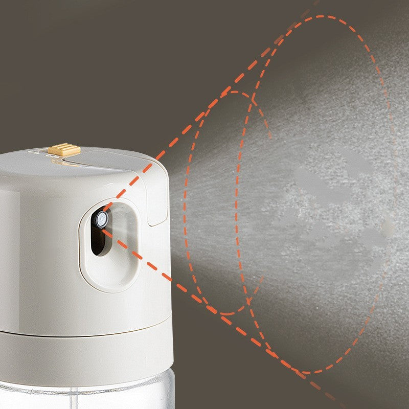 Shopi Vella BBQ cooking oil dispenser spraying a fine mist for even application during grilling