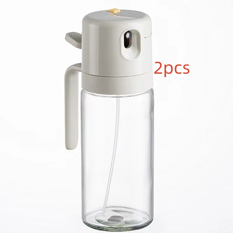 Shopi Vella BBQ cooking oil dispenser with transparent container and white spray top for kitchen storage