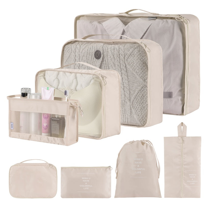 Shopi Vella waterproof travel storage organizer set with multiple beige packing cubes and pouches for home storage