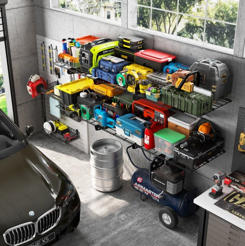 Shopi Vella 24x48 inch storage rack mounted on wall holding various tools and cases in garage