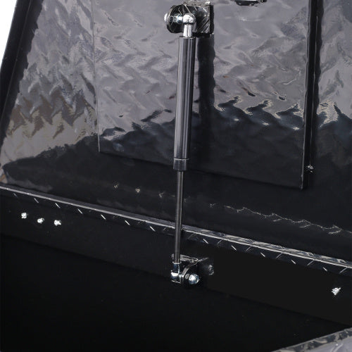 Shopi Vella 29 inch truck bed tool box with black hydraulic lift support and diamond plate design