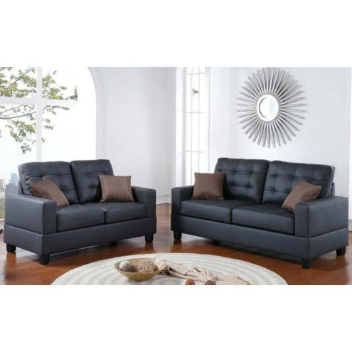 Shopi Vella black faux leather sofa set with tufted cushions and brown pillows in modern living room