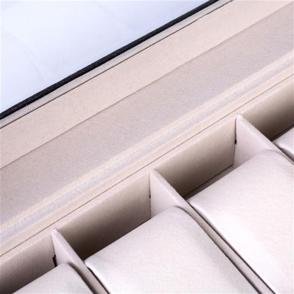Close-up view of beige cushioned compartments in a 20 watch storage box by Shopi Vella
