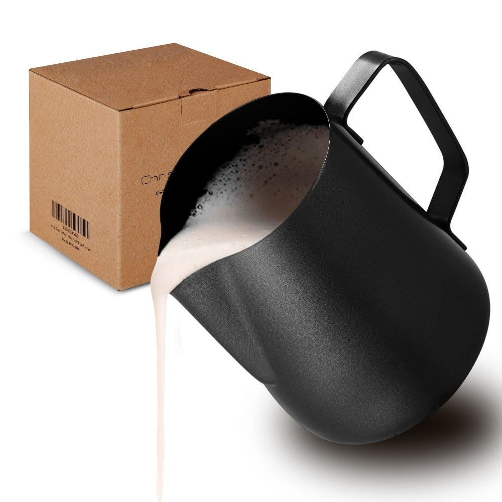 Shopi Vella black stainless steel milk frothing pitcher pouring frothy milk with cardboard box