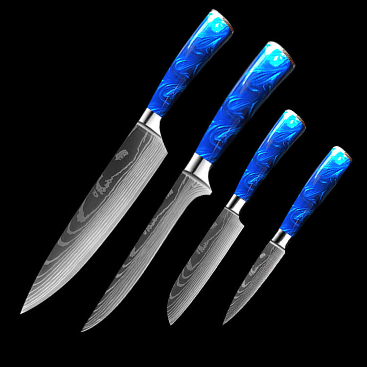 Set of kitchen knives with blue resin handle chef knife featuring patterned steel blades and ergonomic grips