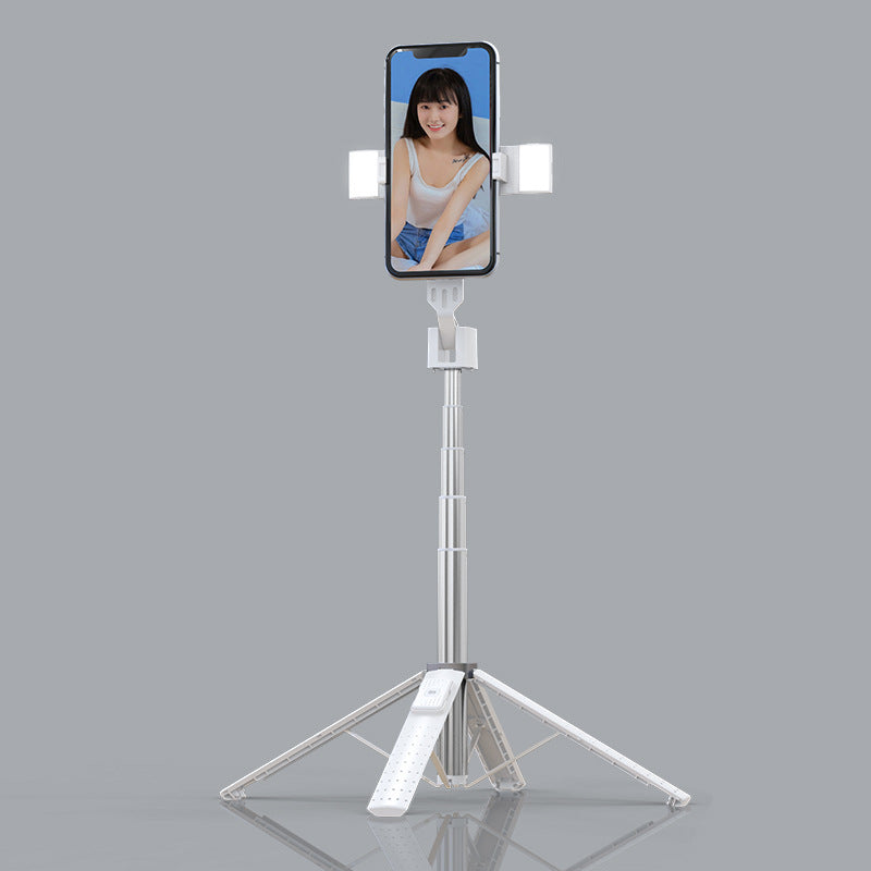 Shopi Vella Bluetooth selfie stick with fill light and tripod stand holding a smartphone