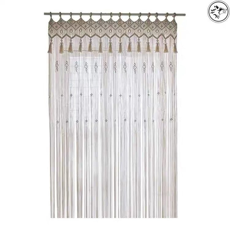 Shopi Vella bohemian hand woven curtain with intricate tassels and delicate geometric patterns