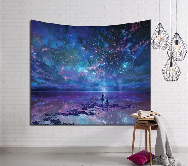 Shopi Vella bohemian mandala wall tapestry with vibrant galaxy night sky design hanging on white brick wall