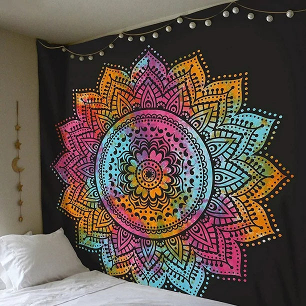 Shopi Vella boho tapestry wall hanging with colorful mandala design displayed above a bed