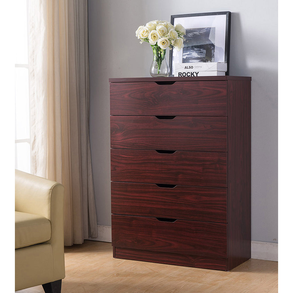Shopi Vella wooden bedroom dresser with five drawers in dark wood finish next to beige chair