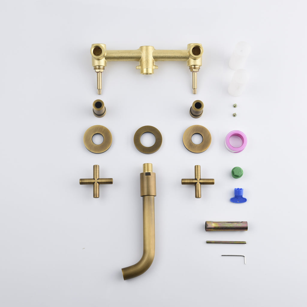 Shopi Vella wall mounted bathroom faucet parts laid out for installation in antique brass finish