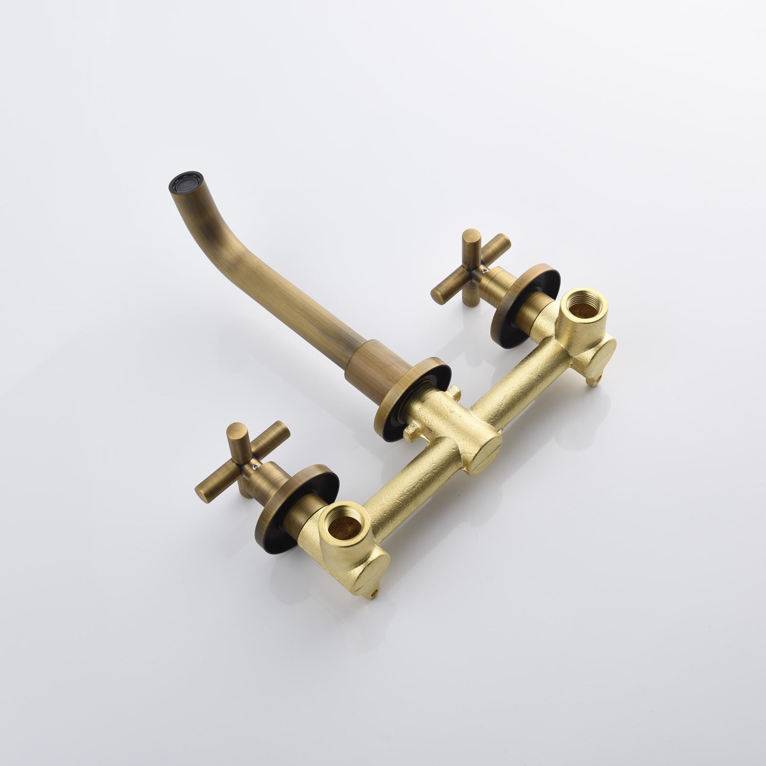 Shopi Vella wall mounted bathroom faucet in antique brass finish with dual cross handles