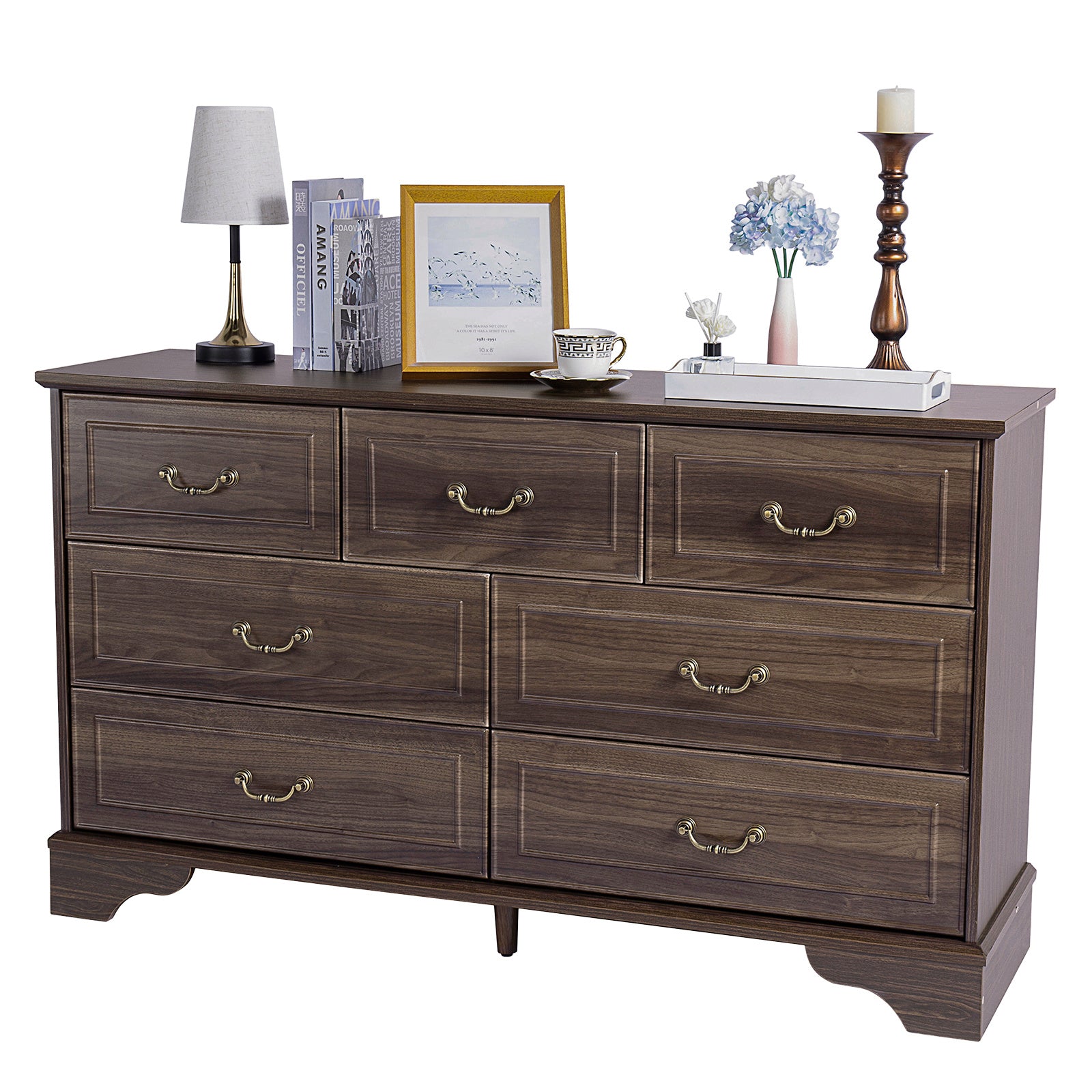 Shopi Vella brown 7-drawer chest of drawers with brass handles and decorative items on top